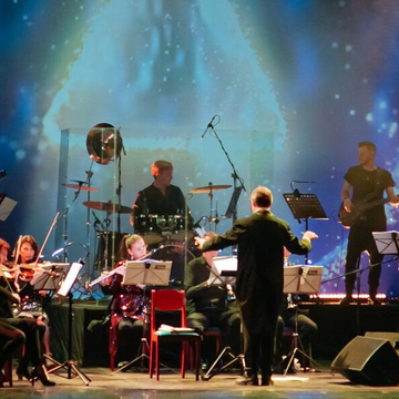 Концерт «Мировые рок-хиты с симфоническим оркестром» на крыше со скидкой 25%