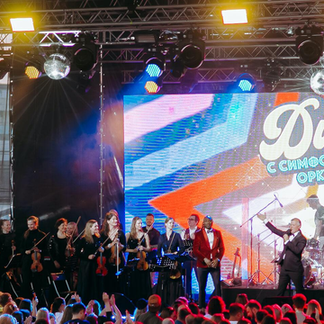 Концерт «Диско с симфоническим оркестром» на крыше Roof Place со скидкой 25%